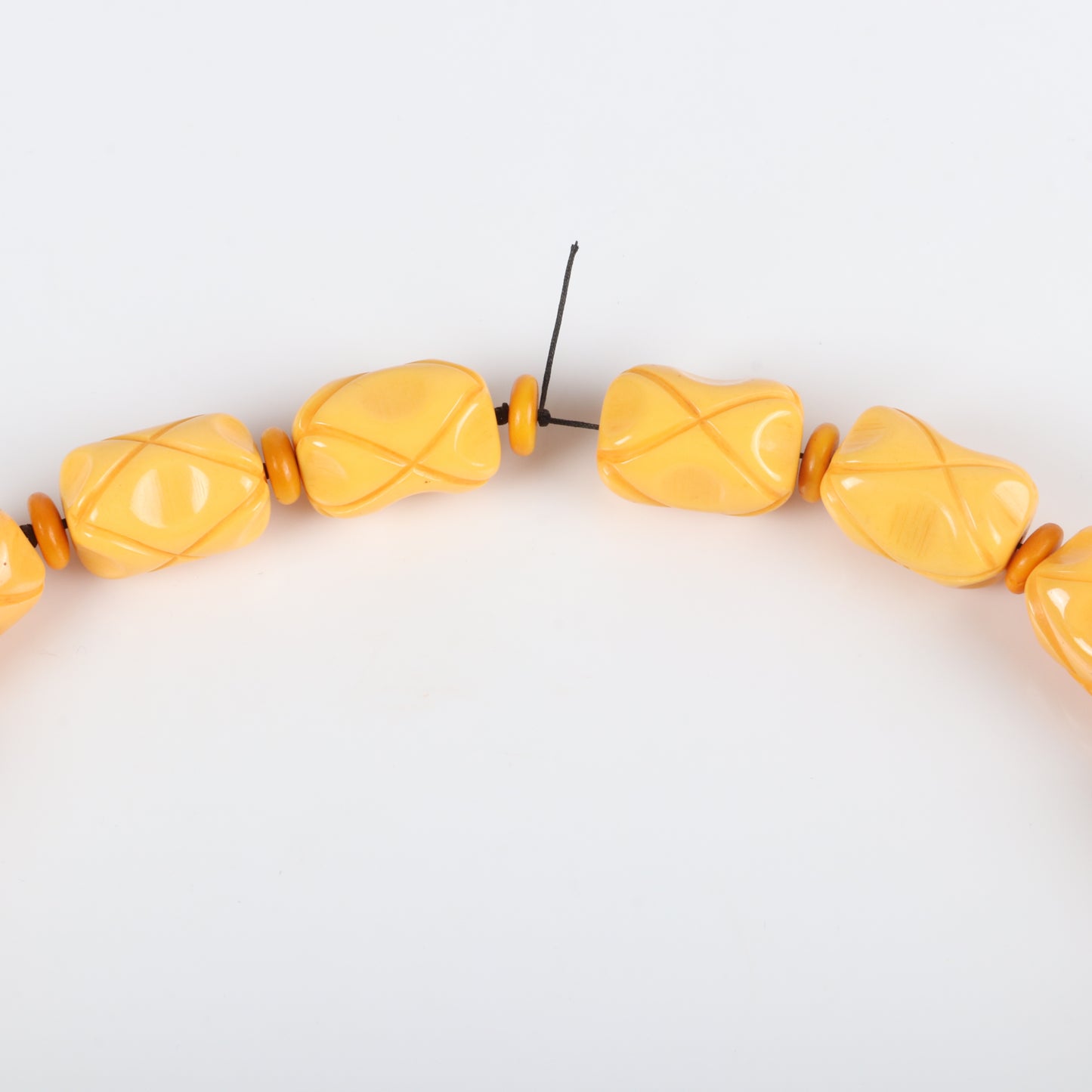 Vintage Bakelite ultra chunky carved beaded necklace. Butterscotch LONG necklace with GIANT carved pinch barrel beads. 29" L