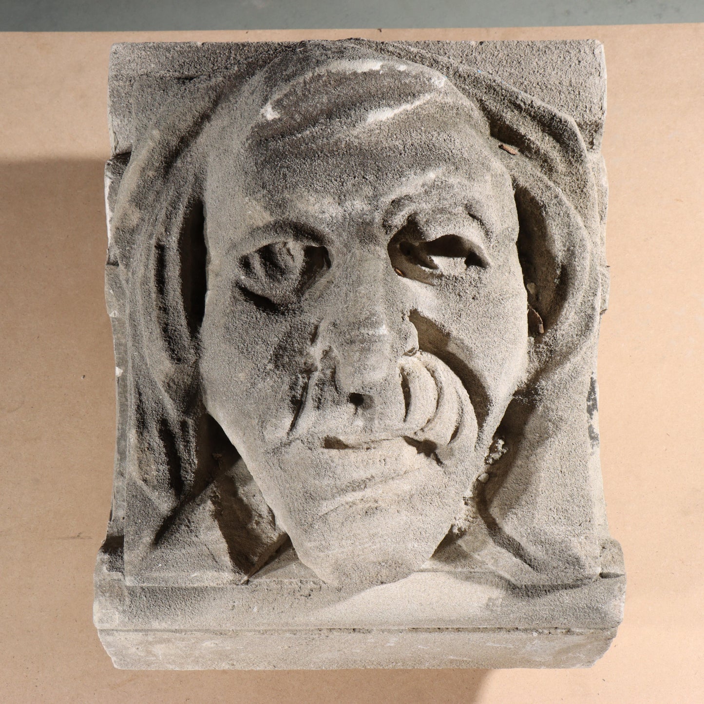 Human face gargoyle/grotesque man with mustache; 1920s Harlem, New York, Gothic Style Architectural Limestone Facade Carving 18 1/2"H x 15"W