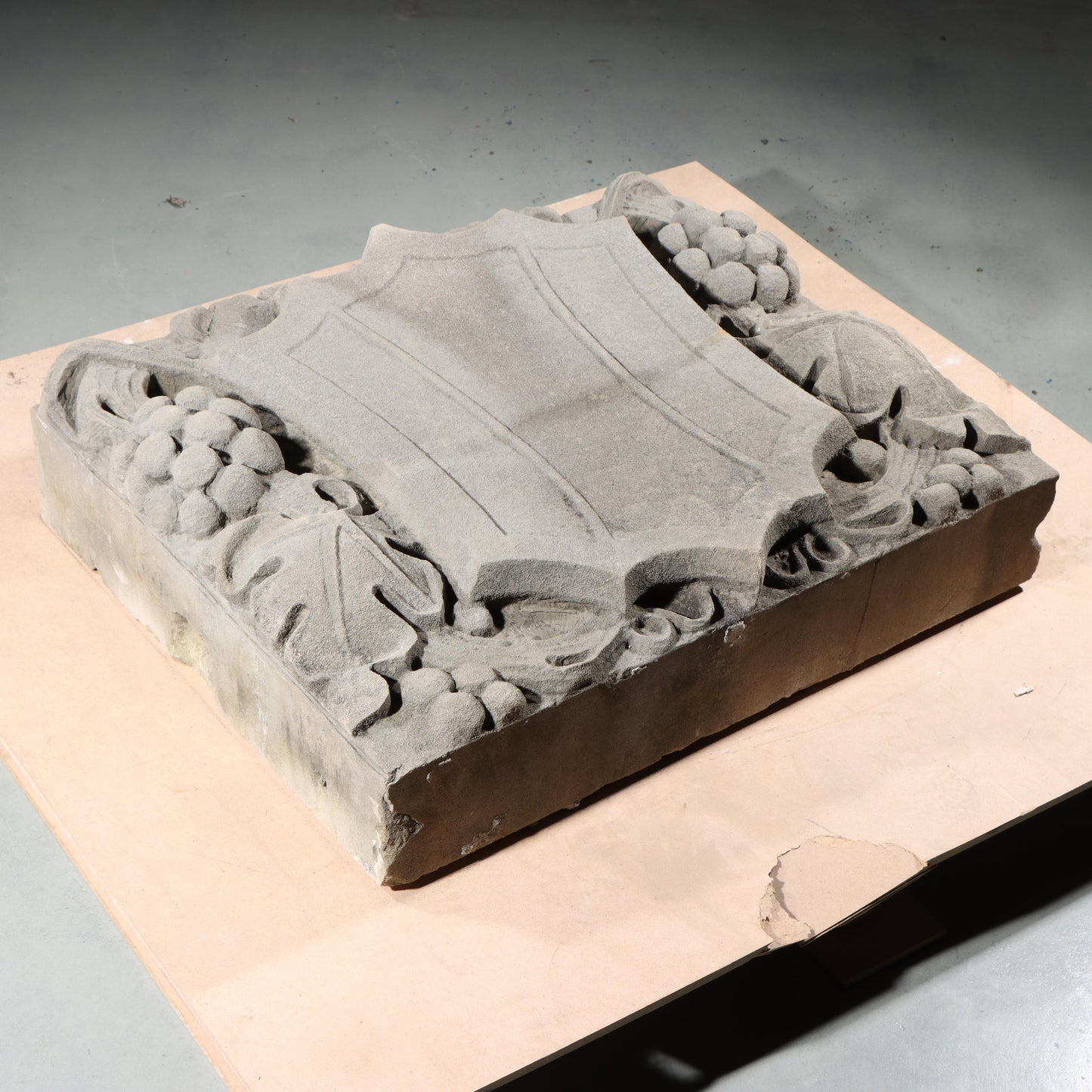 Shield form grape vine foliate relief border slab; 1920s Harlem, New York, Gothic Style Architectural Limestone Facade Carving 22 1/4"H x 28"W