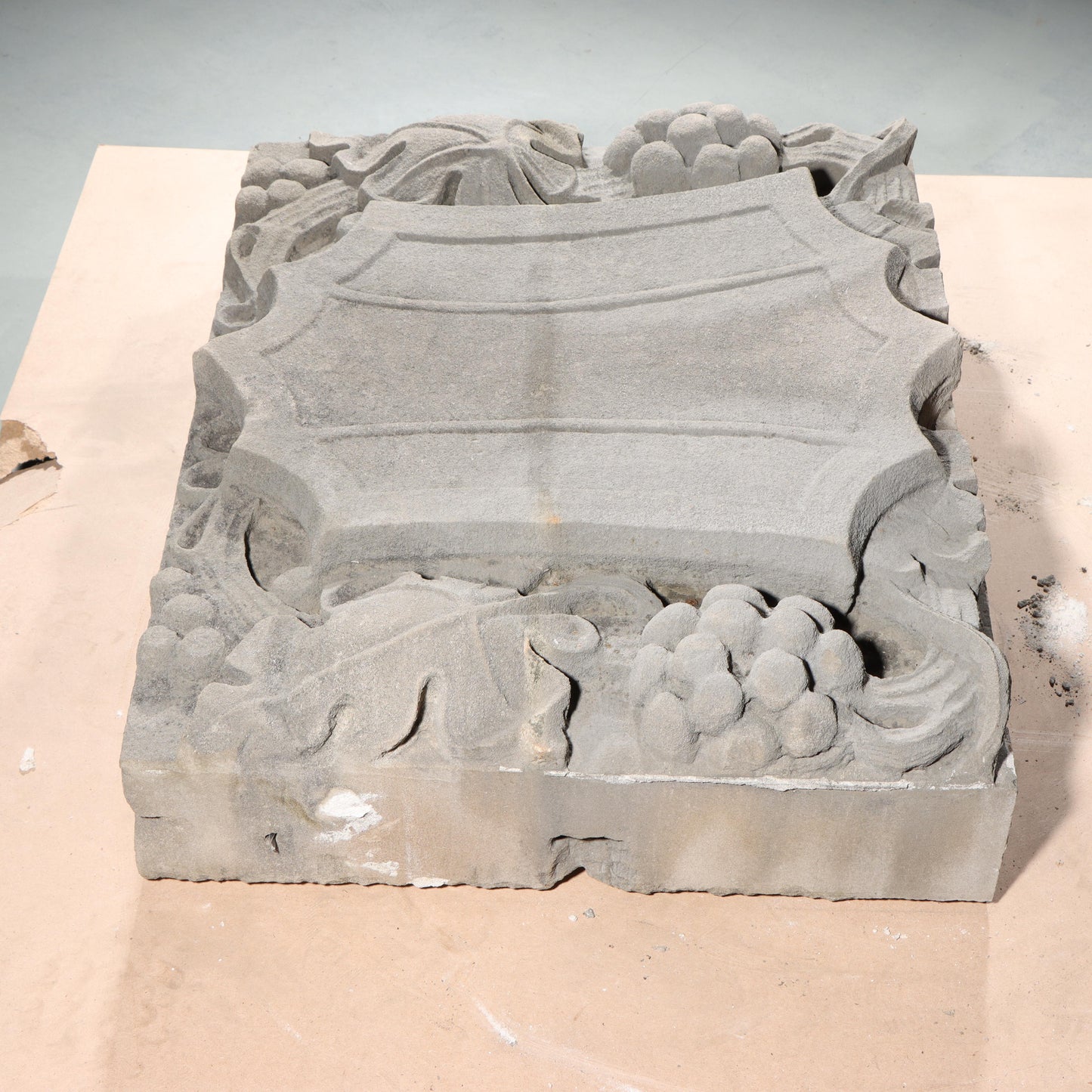 Shield form grape vine foliate relief border slab; 1920s Harlem, New York, Gothic Style Architectural Limestone Facade Carving 22 1/4"H x 28"W
