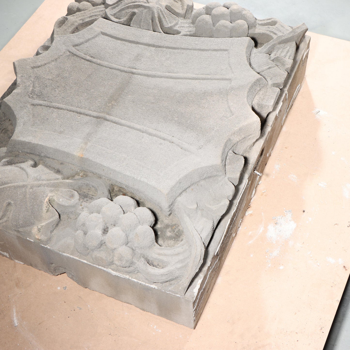 Shield form grape vine foliate relief border slab; 1920s Harlem, New York, Gothic Style Architectural Limestone Facade Carving 22 1/4"H x 28"W