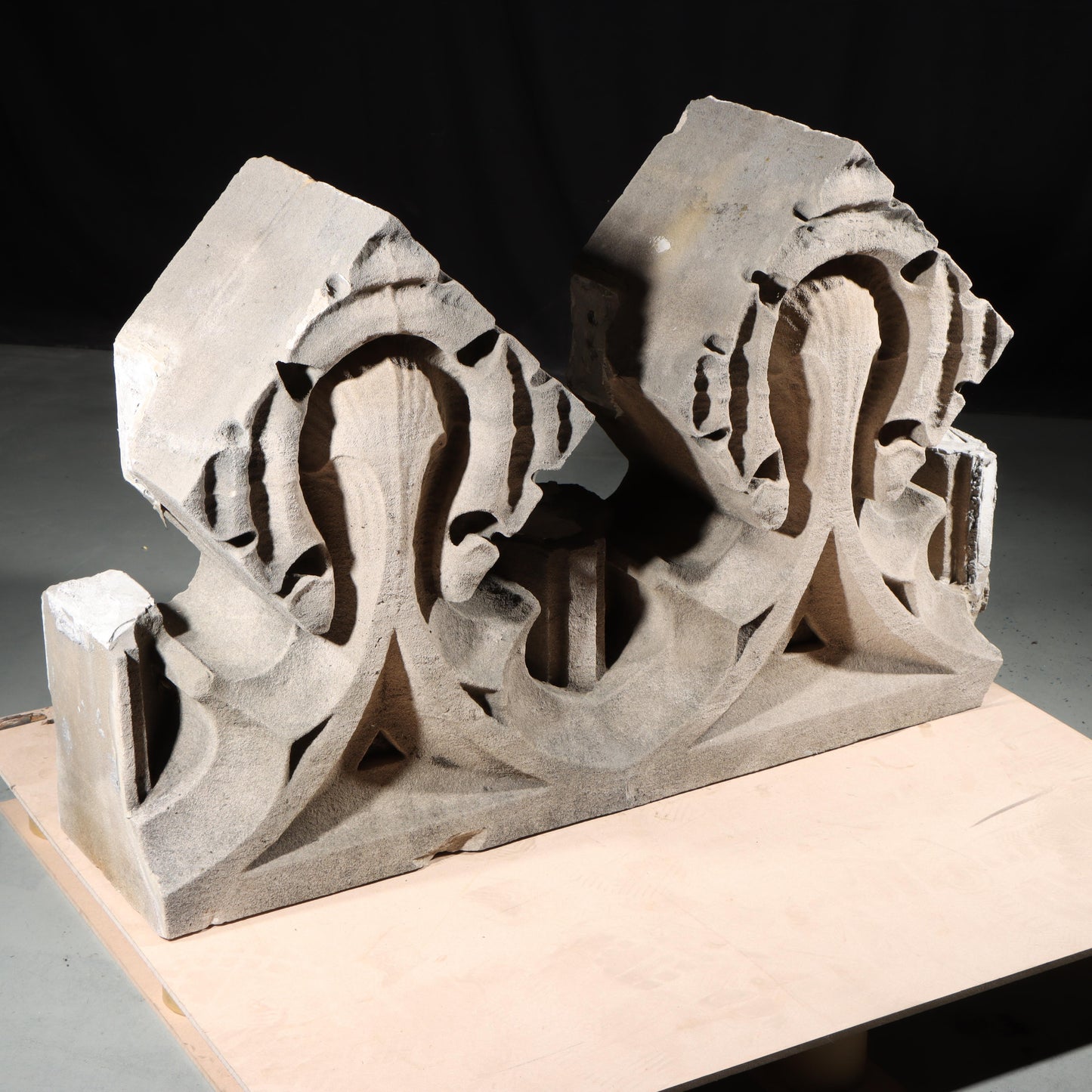 Gothic teardrop arch cornice fragment with scrolling foliate accents; 1920s Harlem, New York, Gothic Style Architectural Limestone Facade Carving 27 1/2"H x 42"W
