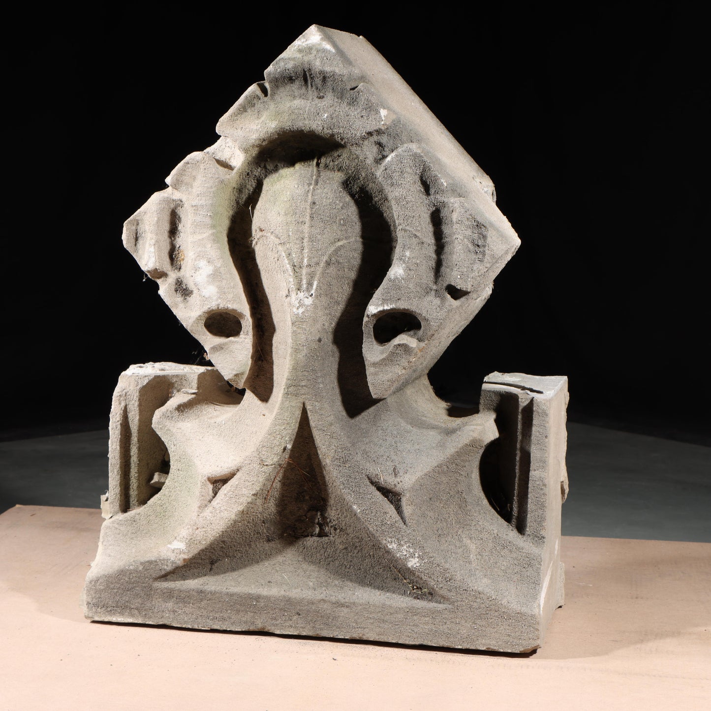 Gothic teardrop arch cornice fragment with scrolling foliate accents; 1920s Harlem, New York, Gothic Style Architectural Limestone Facade Carving 28"H x 21 1/2"W