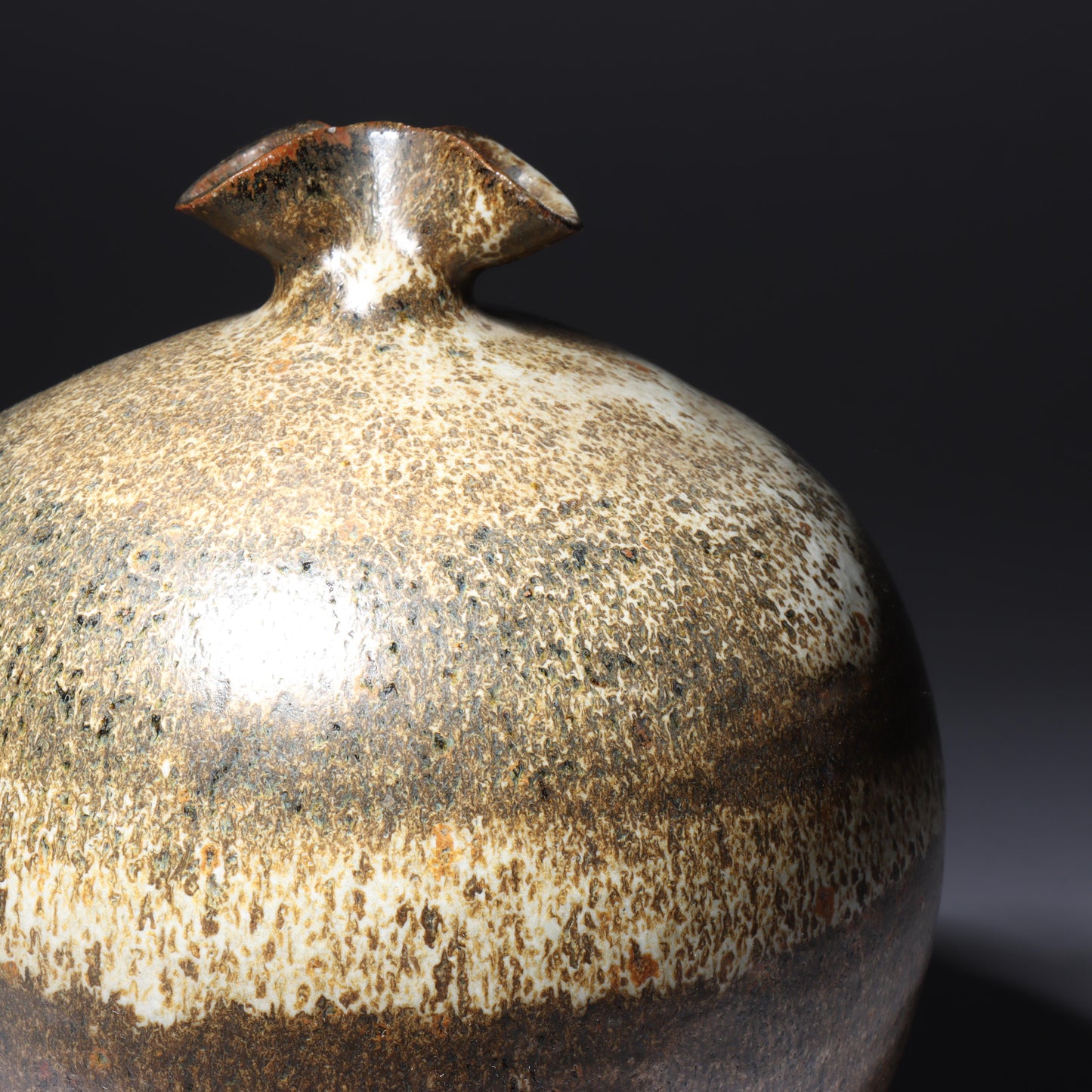 Laura Andreson, California (1902 - 1999), American studio pottery pinch neck bulbous vase, 1979, stoneware mottled banded earthtone glaze, 7 3/4"H x 6 1/2"Diam.
