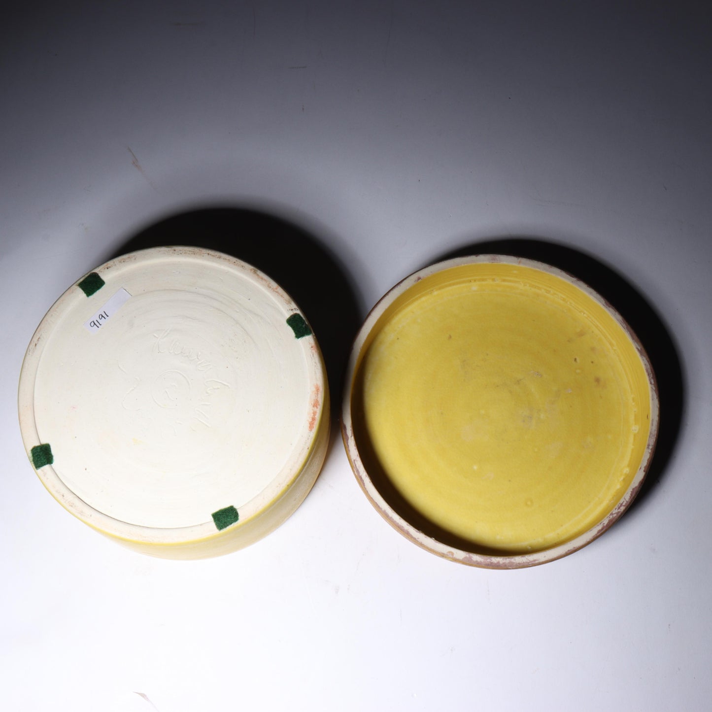 Laura Andreson, California (1902 - 1999), American studio pottery round covered porcelain box, 1975, porcelain, modernist painted design on lid in yellow and brown matte glazes, 3"H x 6"Diam.