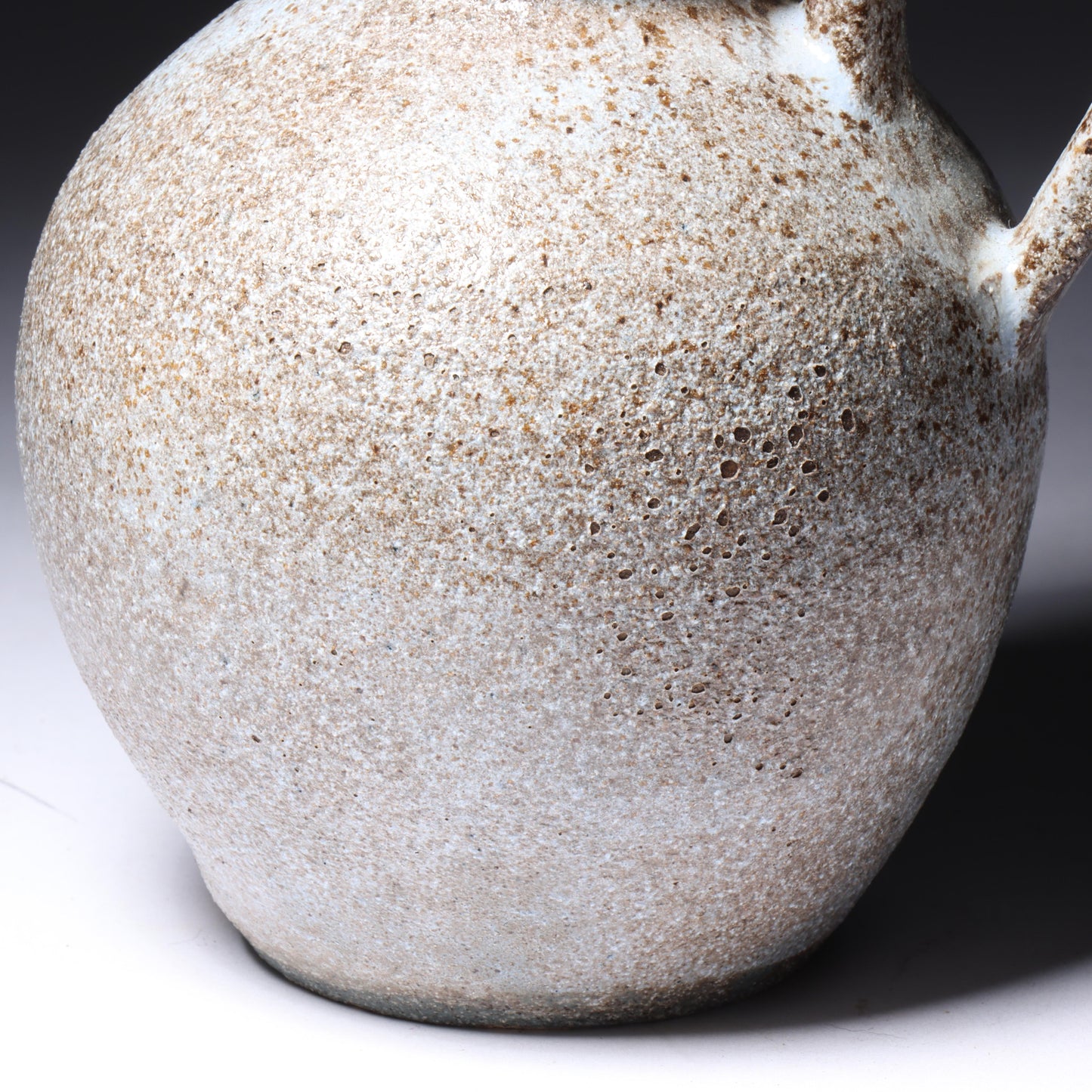 Laura Andreson, California (1902 - 1999), American studio pottery cream pitcher, 1951, bulbous form stoneware with shaped neck and ash glaze, 5 1/4"H x 4 1/2"W