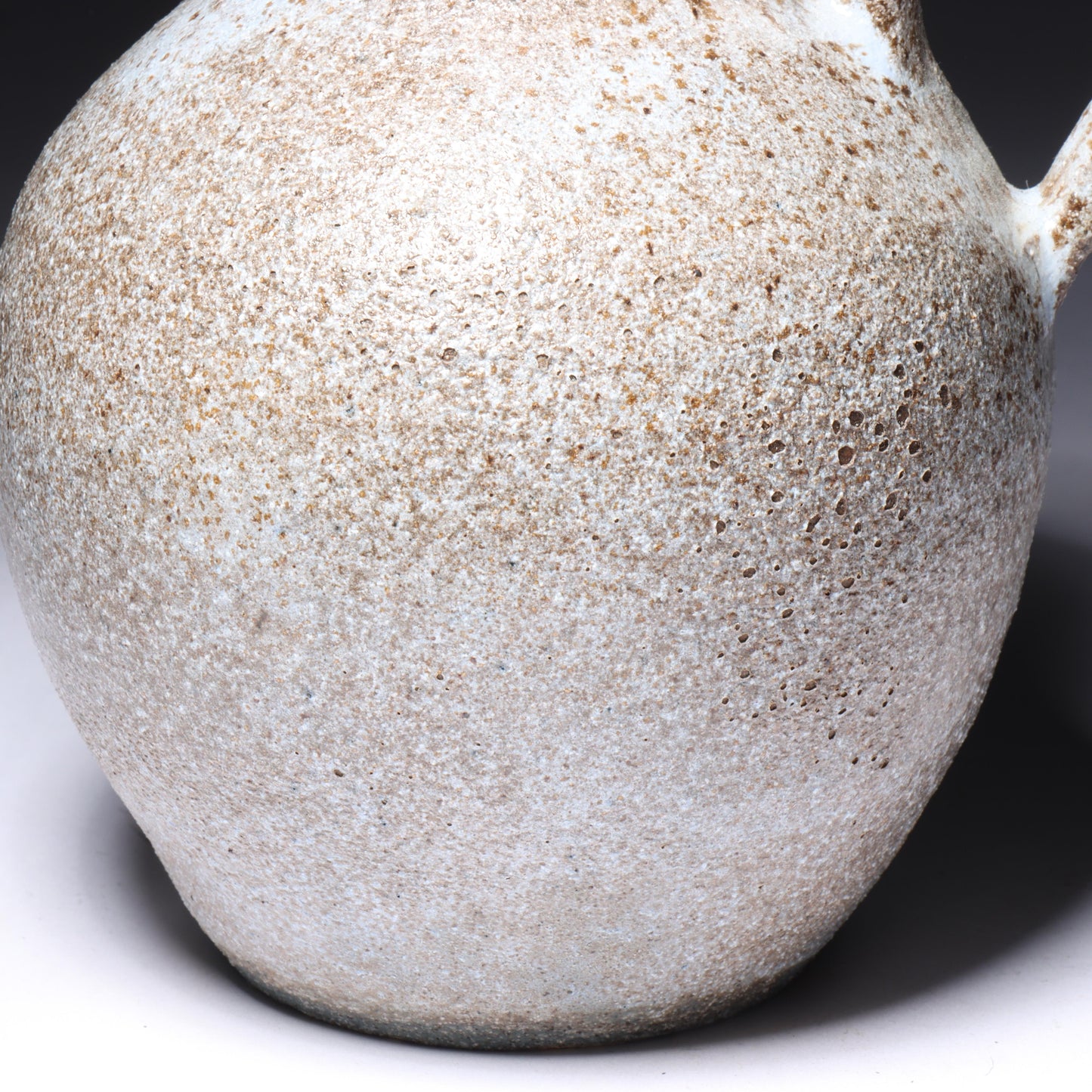 Laura Andreson, California (1902 - 1999), American studio pottery cream pitcher, 1951, bulbous form stoneware with shaped neck and ash glaze, 5 1/4"H x 4 1/2"W