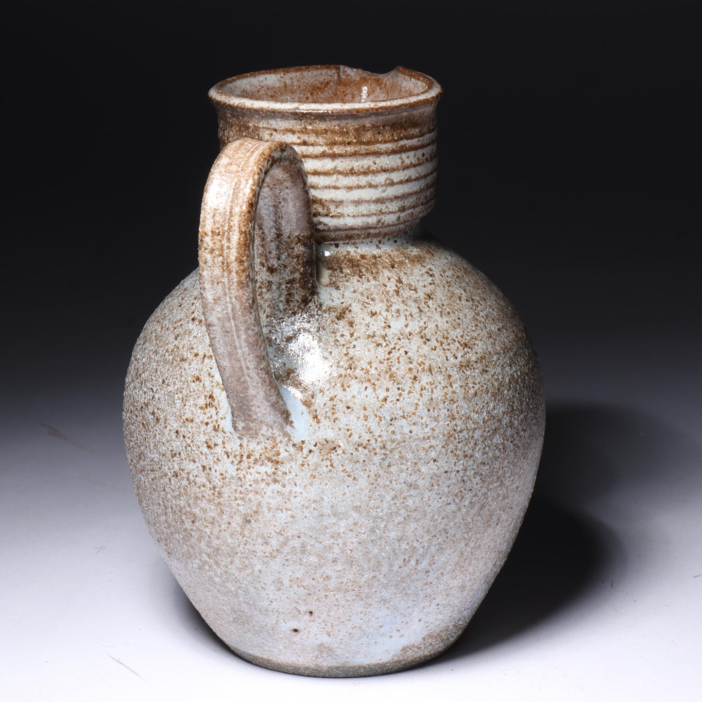 Laura Andreson, California (1902 - 1999), American studio pottery cream pitcher, 1951, bulbous form stoneware with shaped neck and ash glaze, 5 1/4"H x 4 1/2"W