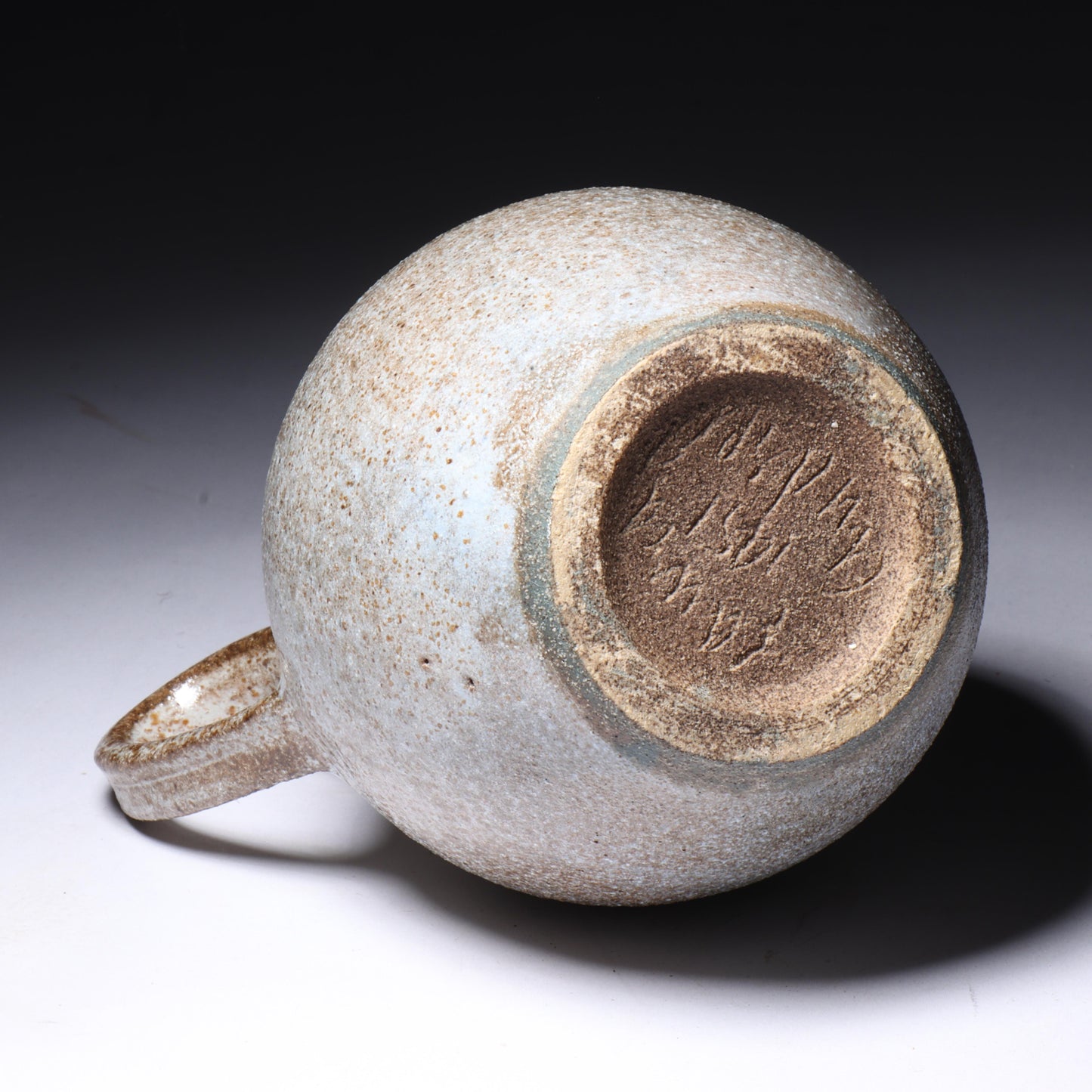 Laura Andreson, California (1902 - 1999), American studio pottery cream pitcher, 1951, bulbous form stoneware with shaped neck and ash glaze, 5 1/4"H x 4 1/2"W