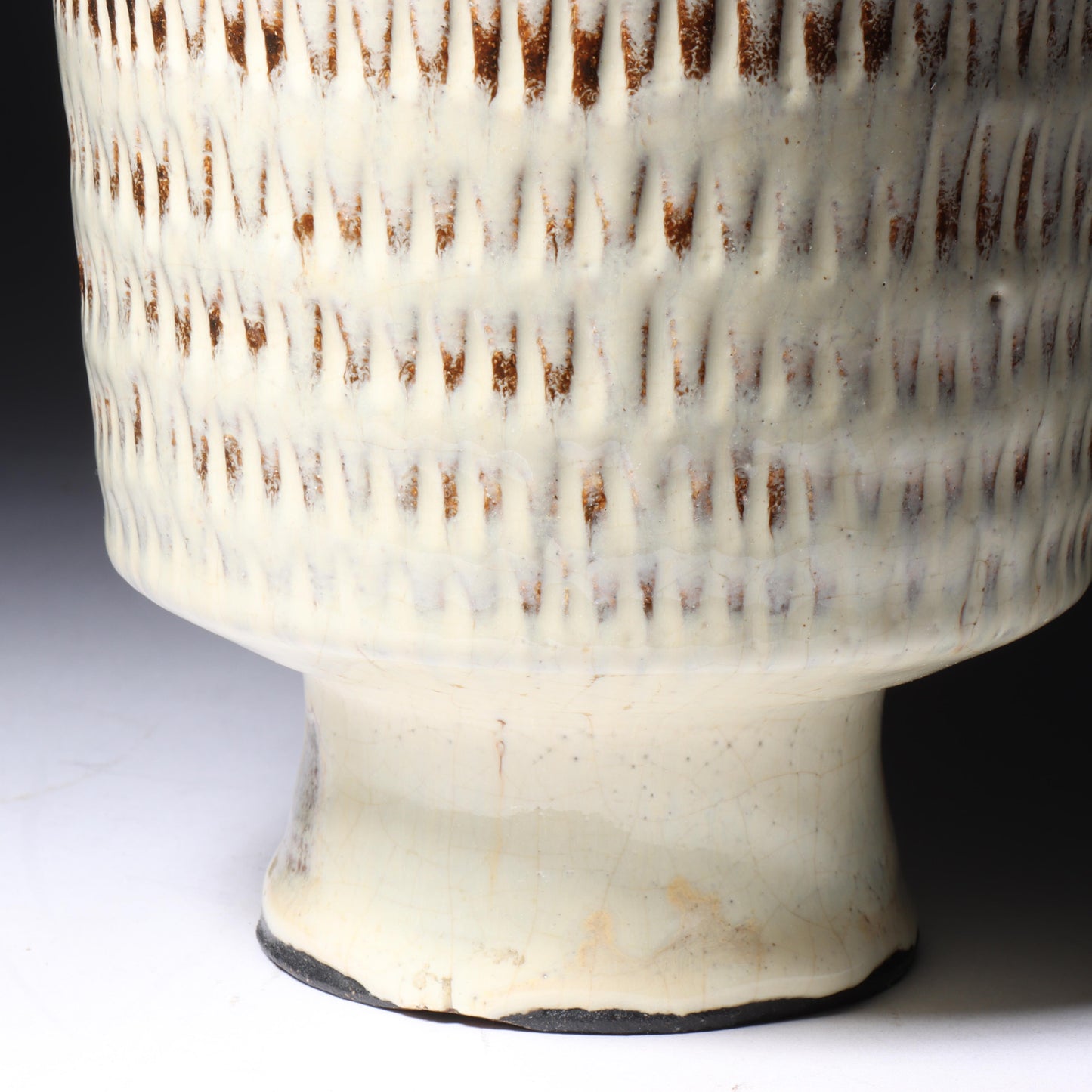 Laura Andreson, California (1902 - 1999), American studio pottery footed vessel, carved mark pattern, white over russet glaze ceramic, 6 1/4"H x 5 1/4"Diam.