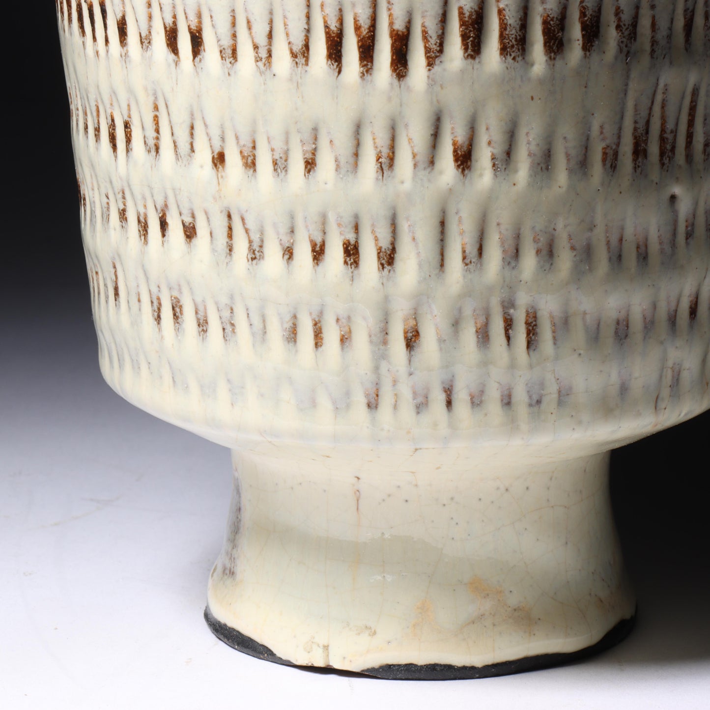 Laura Andreson, California (1902 - 1999), American studio pottery footed vessel, carved mark pattern, white over russet glaze ceramic, 6 1/4"H x 5 1/4"Diam.