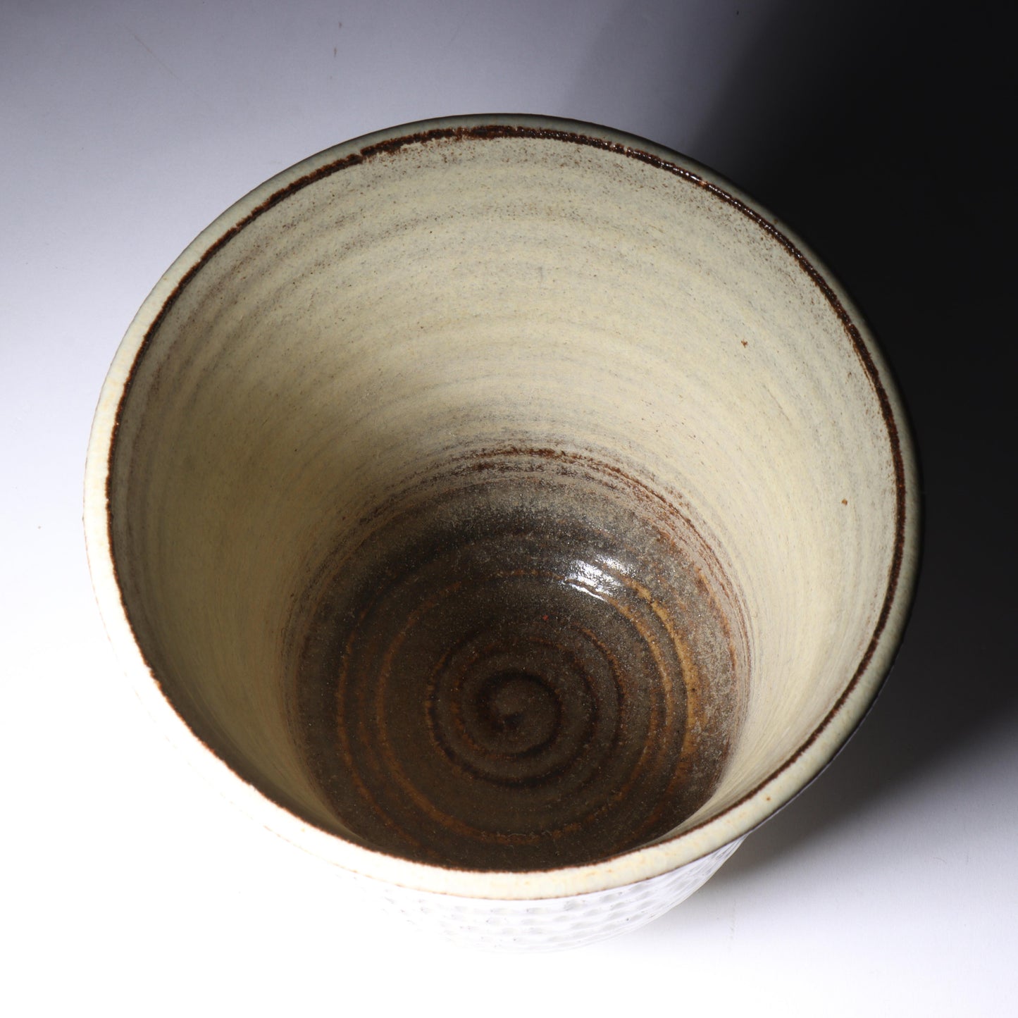 Laura Andreson, California (1902 - 1999), American studio pottery footed vessel, carved mark pattern, white over russet glaze ceramic, 6 1/4"H x 5 1/4"Diam.