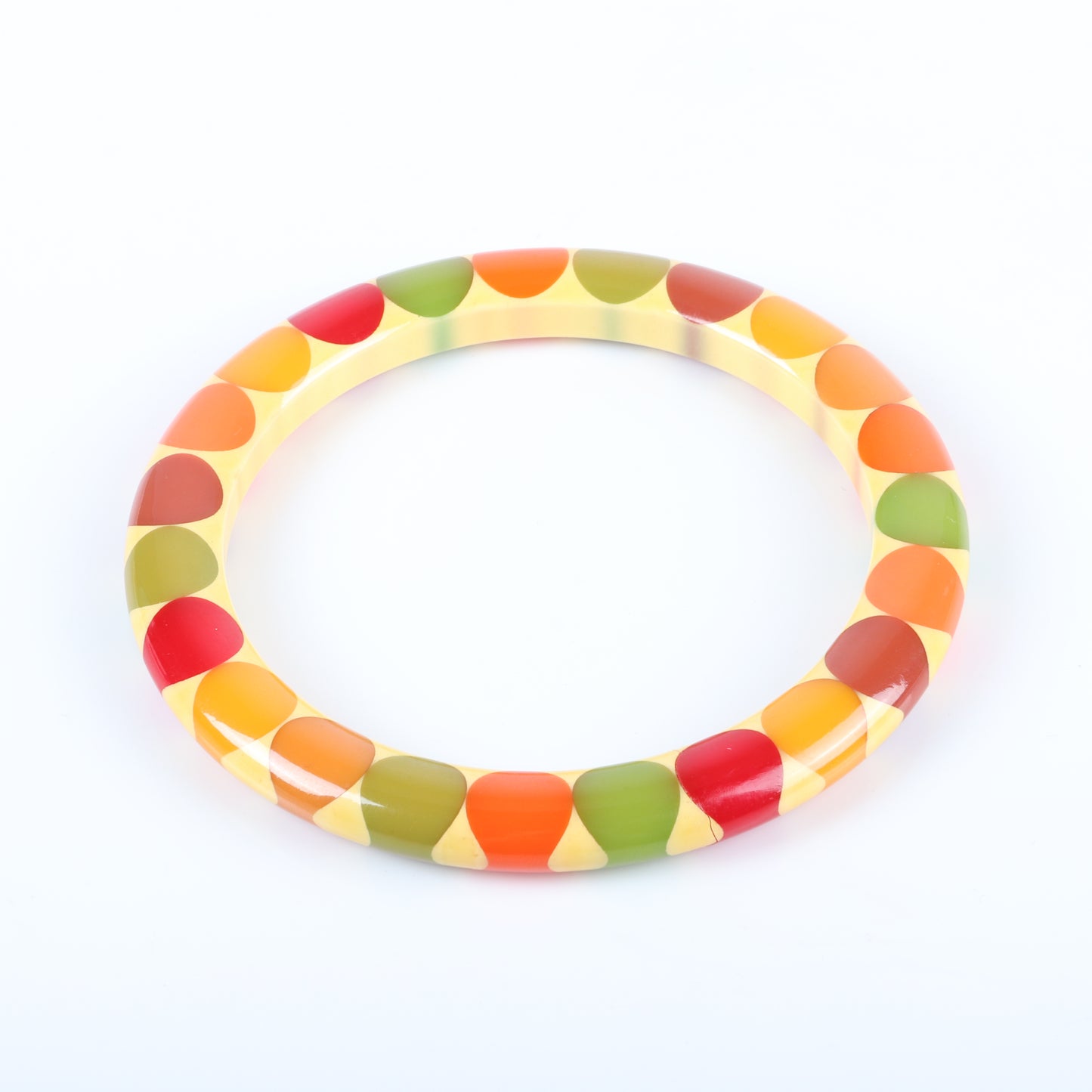 Vintage Bakelite RARE multi-color Bow Tie bangle bracelet. Invisible crack, secured by glue 2 1/2" inner diam., 1/4" W