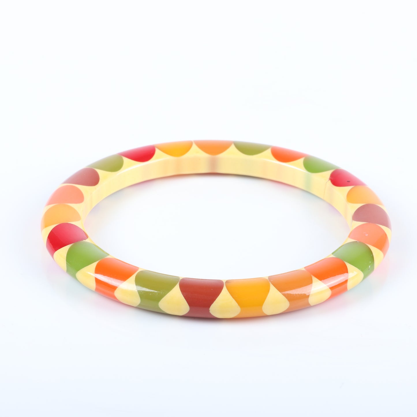 Vintage Bakelite RARE multi-color Bow Tie bangle bracelet. Invisible crack, secured by glue 2 1/2" inner diam., 1/4" W