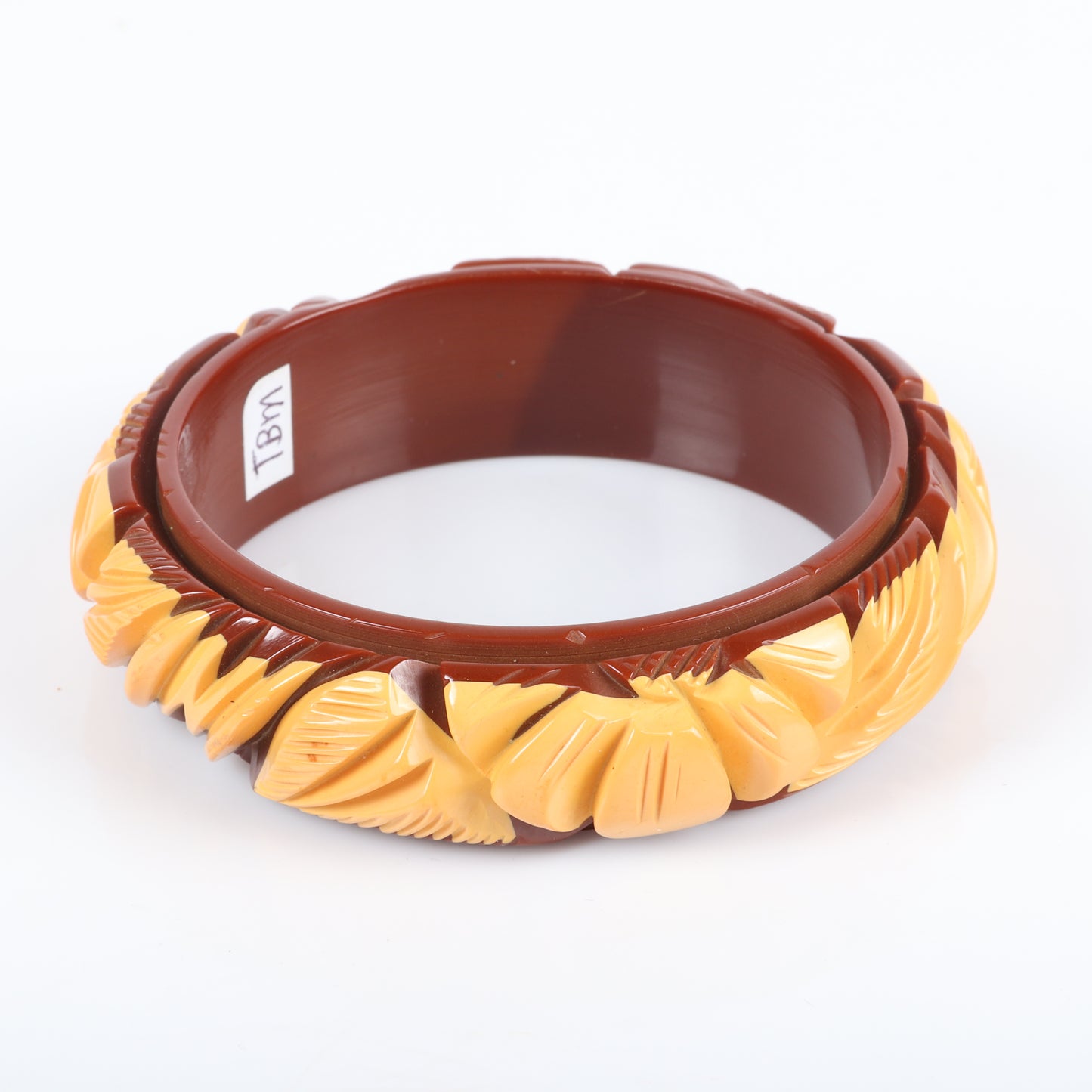 Vintage Bakelite laminated and deep carved flower bangle bracelet in 2 colors, brown and butterscotch. 2 1/2" inner diam., 3/4" W