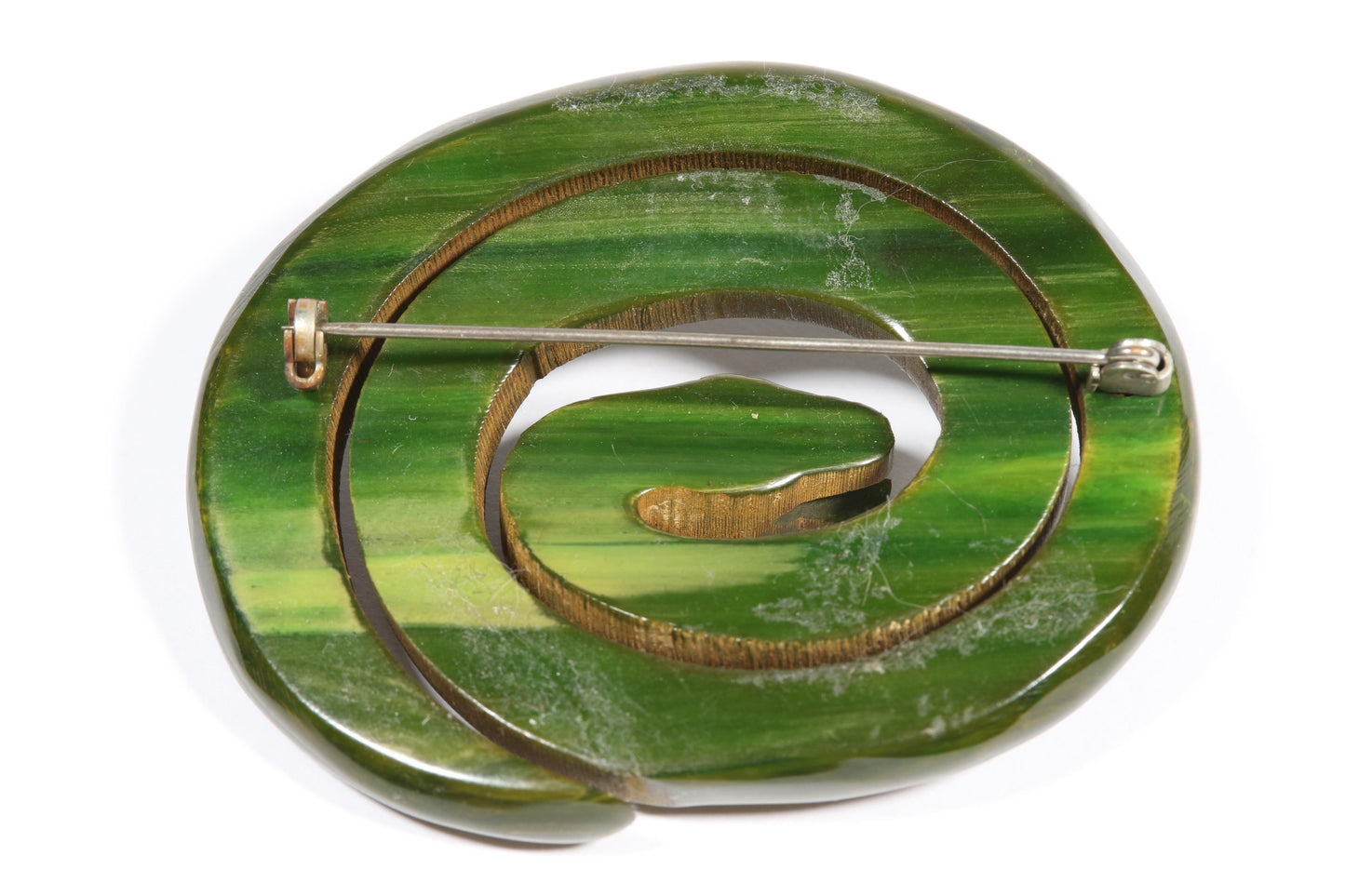 Vintage Book Piece RARE carved figural spinach Bakelite serpent snake brooch with red jeweled eyes. 2"H x 2 3/8"W