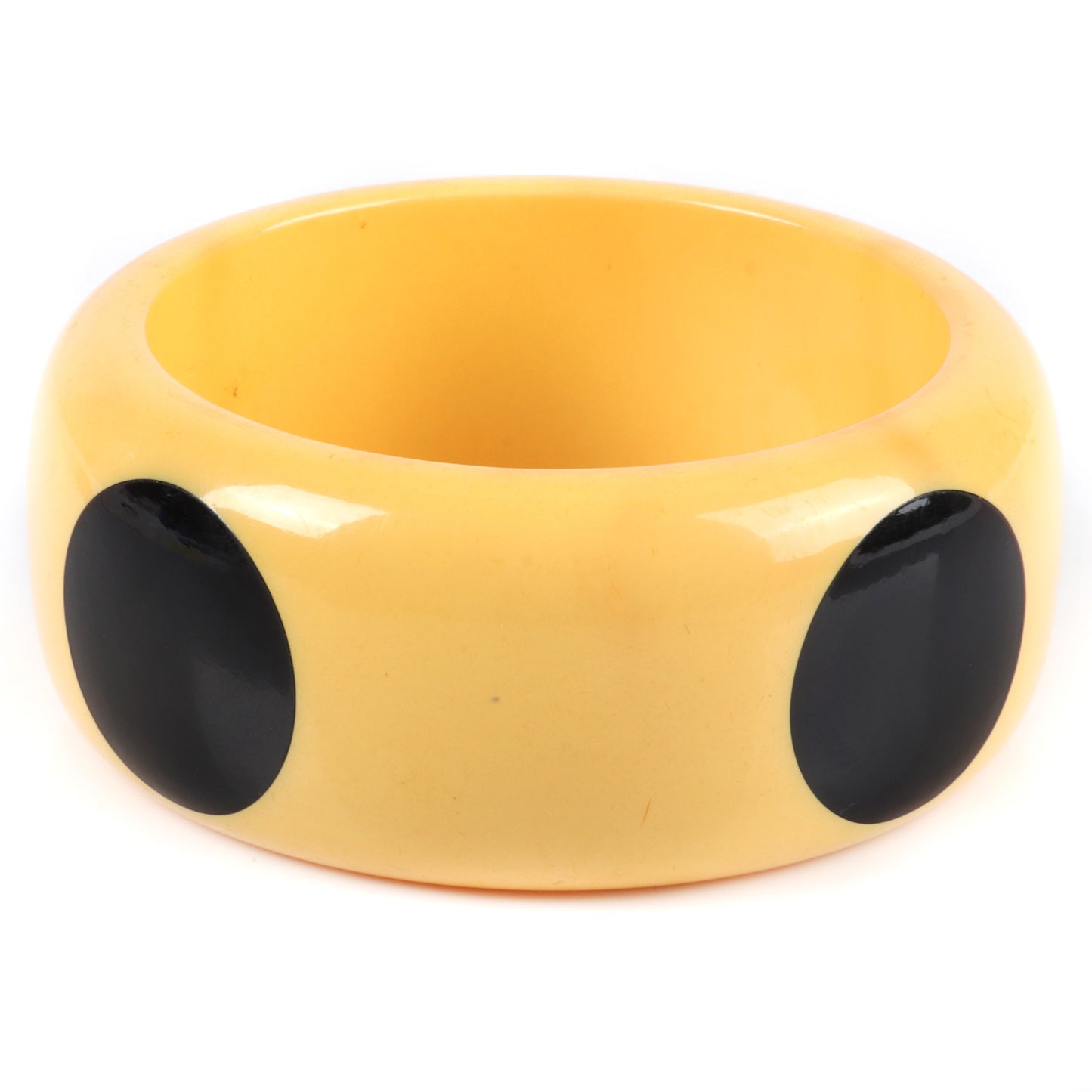 Vintage Bakelite big dot WIDE bangle bracelet in butterscotch with 4 black polka dots. 2 1/2" inner diam., 1 1/2" W