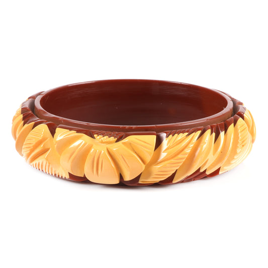Vintage Bakelite laminated and deep carved flower bangle bracelet in 2 colors, brown and butterscotch. 2 1/2" inner diam., 3/4" W