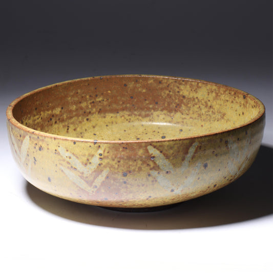 Laura Andreson, California (1902 - 1999), American studio pottery bowl, 1955, stoneware with mustard over brown glaze and spatter with painted mark pattern, 3"H x 8 1/4"Diam.
