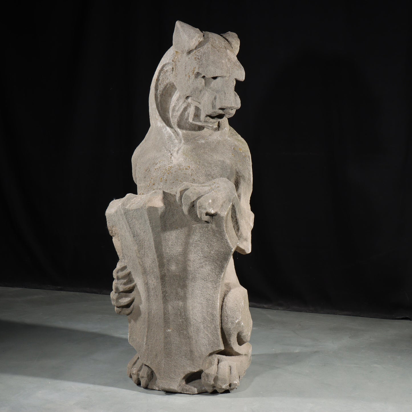 Heraldic Lion Guardian; full body gargoyle/grotesque beast with shield: 1920s Harlem, New York, Gothic Style Architectural Limestone Facade Carving. 45 1/2"H x 18"W