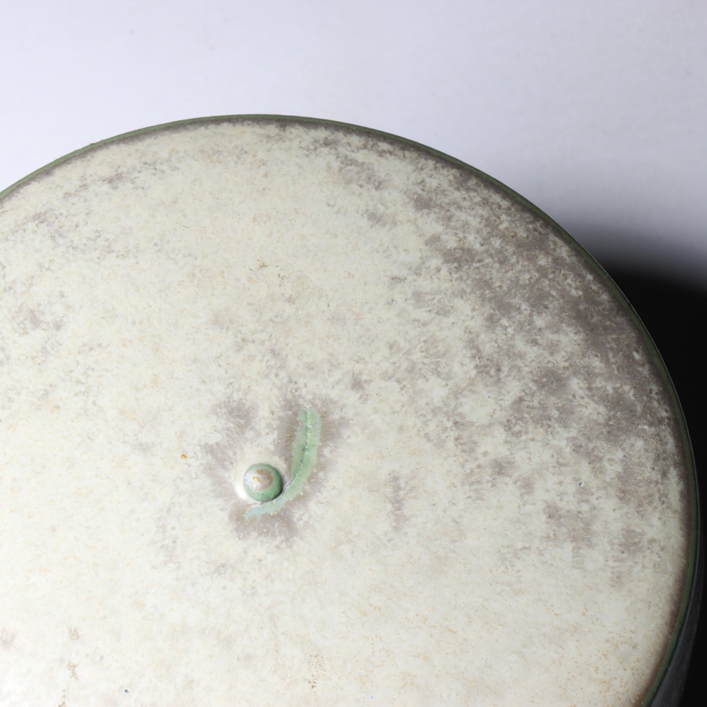 Laura Andreson, California (1902 - 1999), American studio pottery round lidded box, 1976, porcelain with complex white and gray brushed over layered sage green over blue matte glaze, 2 1/4"H x 3 1/4"Diam.