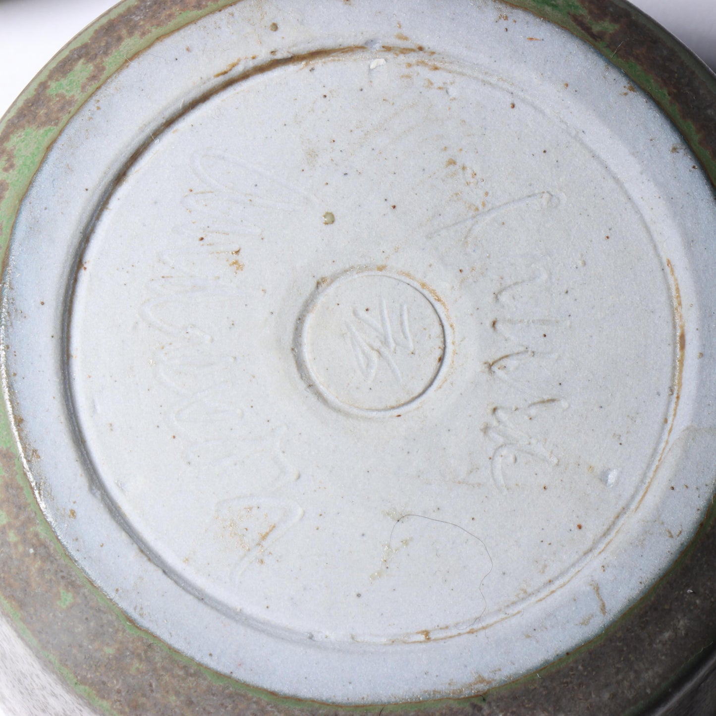 Laura Andreson, California (1902 - 1999), American studio pottery round lidded box, 1976, porcelain with complex white and gray brushed over layered sage green over blue matte glaze, 2 1/4"H x 3 1/4"Diam.